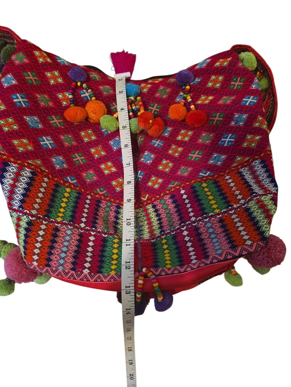 Colorful, handcrafted bohemian shoulder bag with traditional woven details